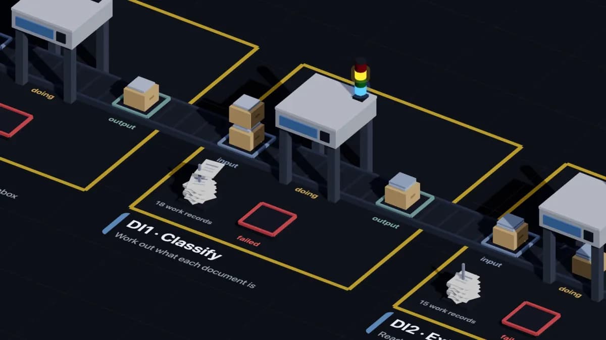 Close-up of a station with crates in its input, doing and output trays, and an empty red failed tray.